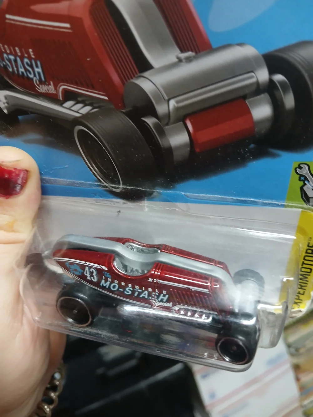 Mo-Stash die-cast toy car from the 2024 Hot Wheels Experimotors series (4/5, mai